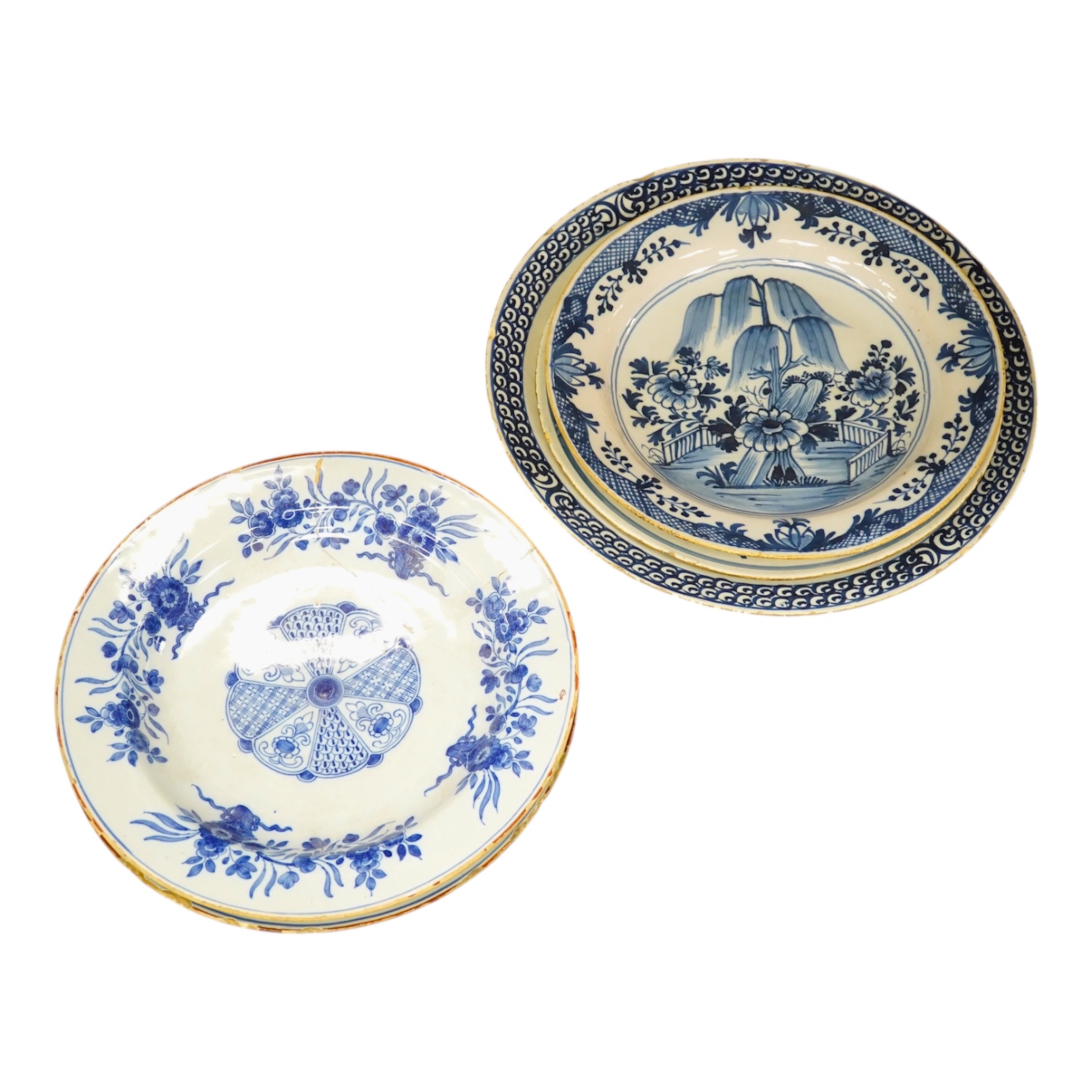 Five 18th century Delft dishes, largest 36.5cm diameter. Condition - poor to fair